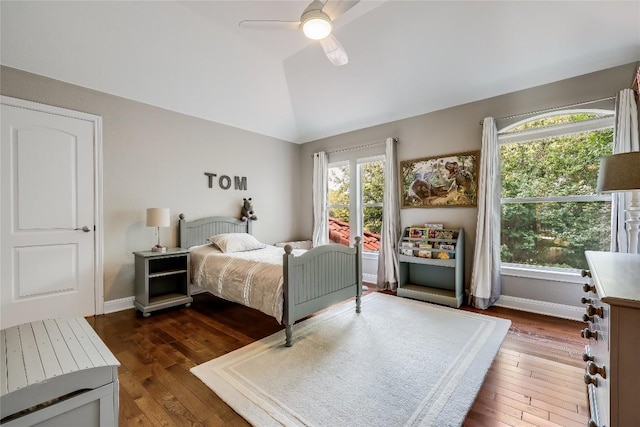 2116 Demona Dr, Austin, TX 78733 - bedroom featuring dark wood finished floors, vaulted ceiling, baseboards, and ceiling fan