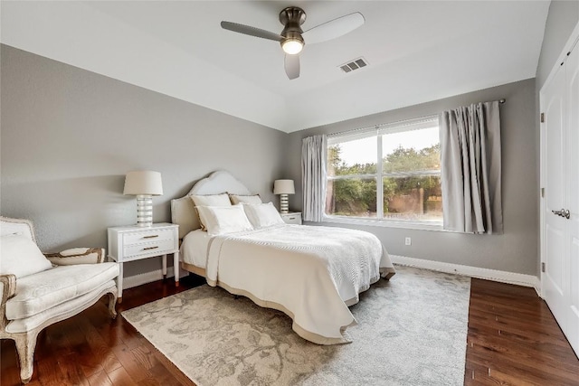 2116 Demona Dr, Austin, TX 78733 - bedroom with wood finished floors, baseboards, a ceiling fan, and vaulted ceiling