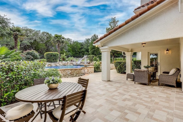 2116 Demona Dr, Austin, TX 78733 - view of patio with an outdoor pool and outdoor dining space
