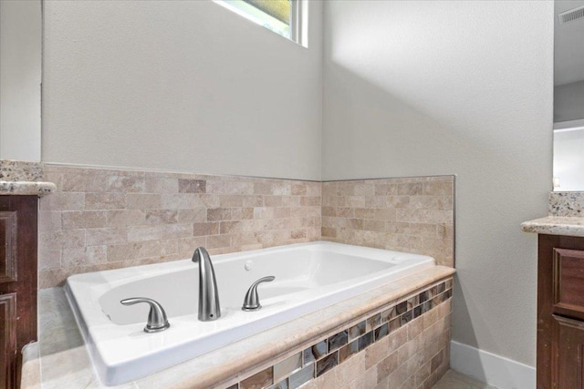 113 N Buckhorn Dr, Bastrop, TX 78602 - full bath featuring vanity and a bath