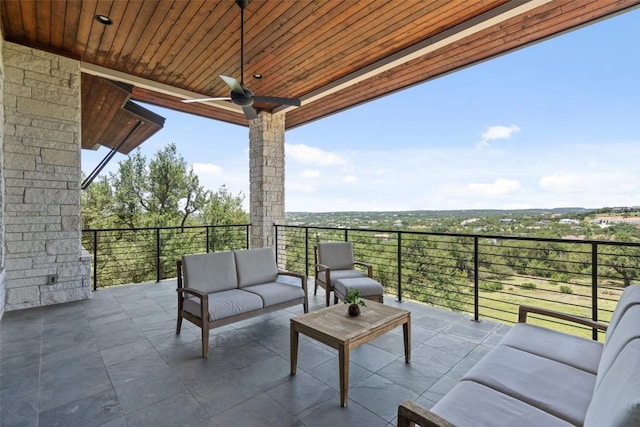 view of patio featuring an outdoor living space and ceiling fan