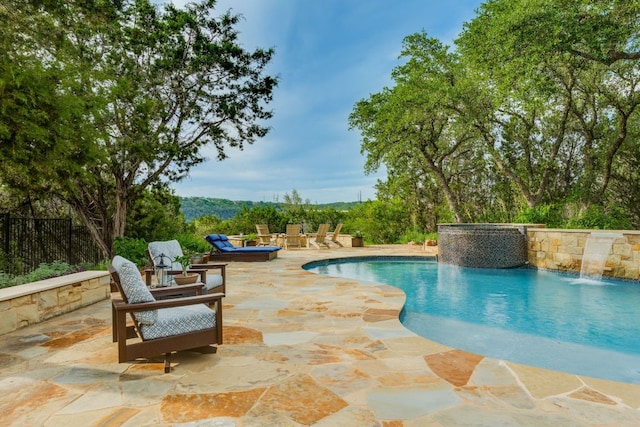 13708 Montview Dr, Austin, TX 78732 - view of swimming pool featuring a patio and fence
