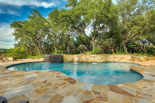 13708 Montview Dr, Austin, TX 78732 - outdoor pool featuring a patio and view of wooded area