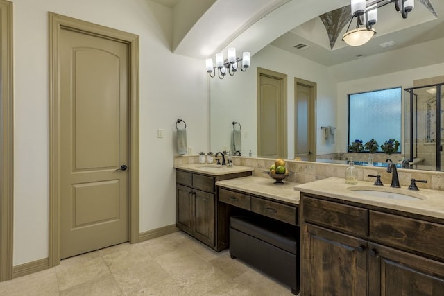 13708 Montview Dr, Austin, TX 78732 - bathroom featuring double vanity, a shower stall, and baseboards
