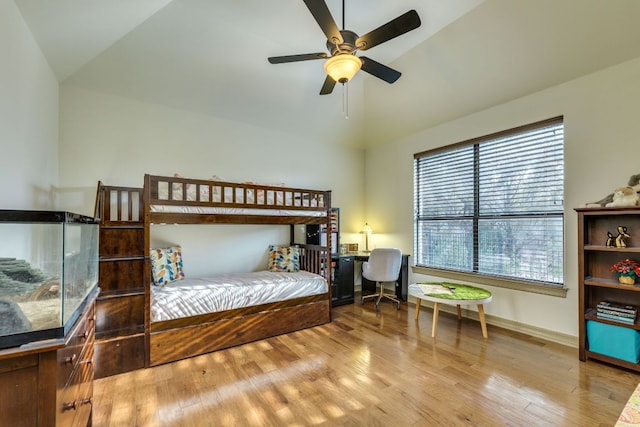 13708 Montview Dr, Austin, TX 78732 - bedroom featuring lofted ceiling, wood finished floors, baseboards, and a ceiling fan