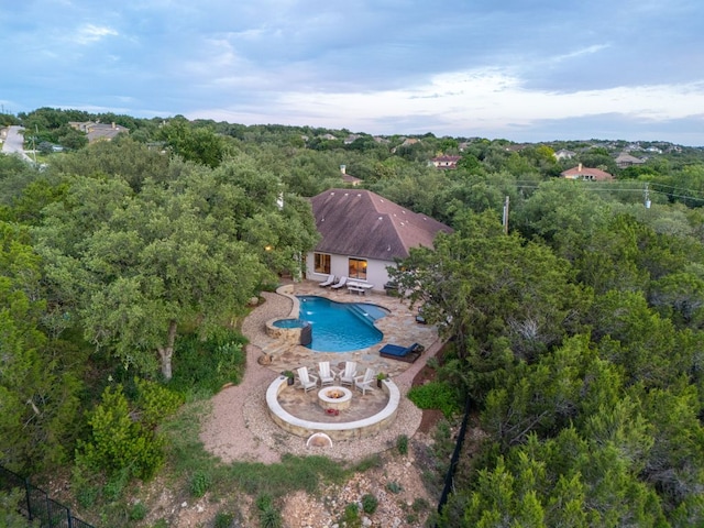 13708 Montview Dr, Austin, TX 78732 - view of subject property with a pool and a forest