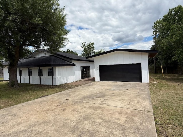 garage with driveway