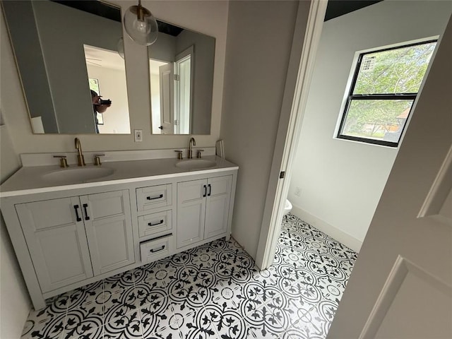 full bathroom featuring double vanity