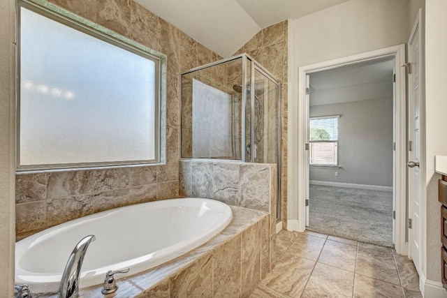 full bath featuring a garden tub, a shower stall, baseboards, and vanity