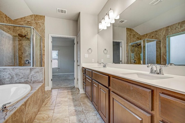 full bath featuring vaulted ceiling, a stall shower, a garden tub, double vanity, and baseboards
