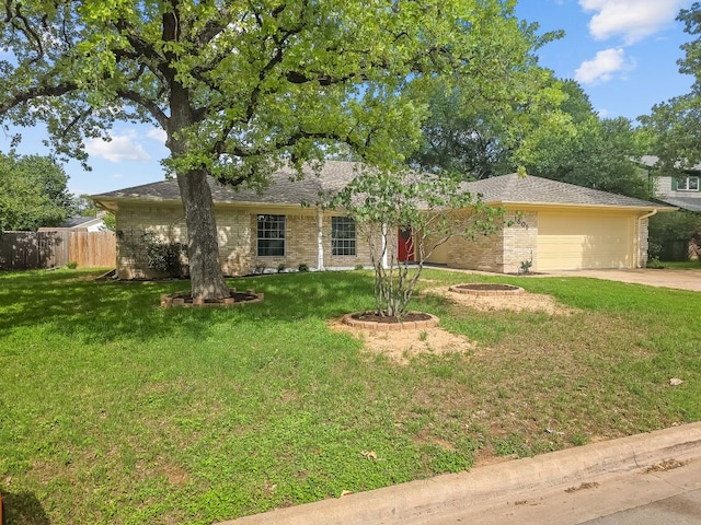 1801 Rock Creek Dr, Round Rock, TX 78681 - ranch-style home with driveway, an attached garage, and brick siding