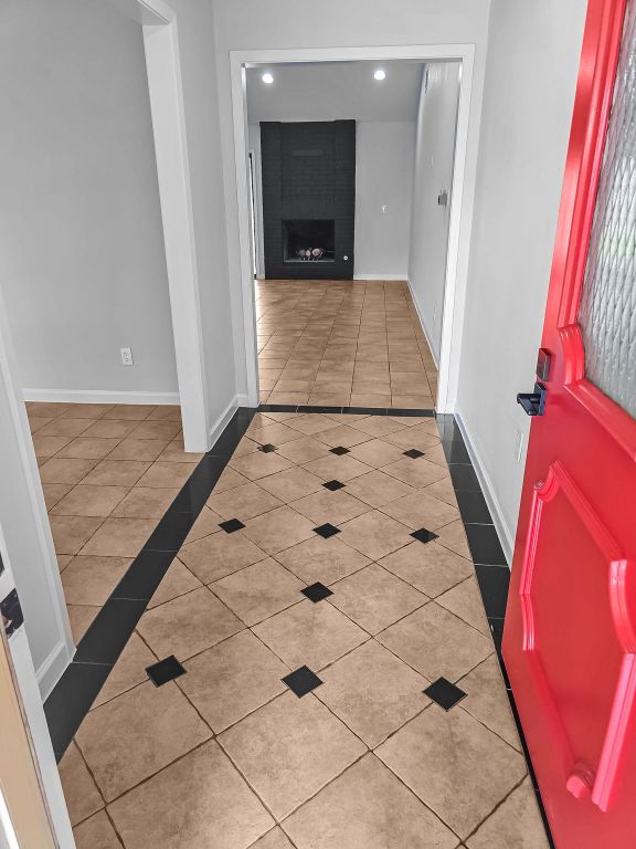 1801 Rock Creek Dr, Round Rock, TX 78681 - hallway featuring tile patterned floors, baseboards, recessed lighting, and inlaid floor details