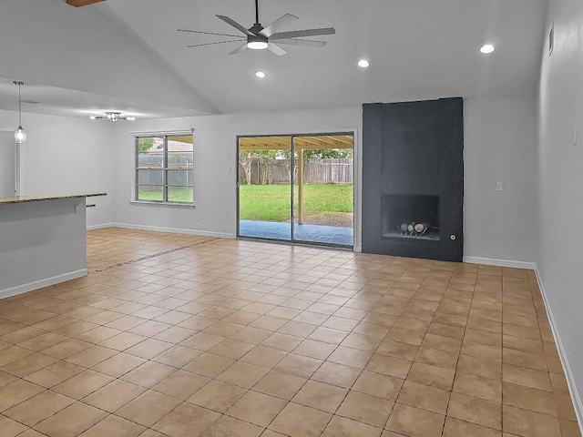 1801 Rock Creek Dr, Round Rock, TX 78681 - unfurnished living room with a ceiling fan, vaulted ceiling, baseboards, light tile patterned floors, and recessed lighting