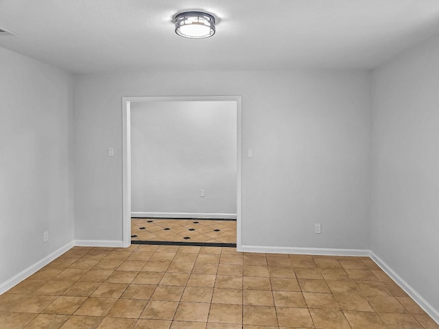 1801 Rock Creek Dr, Round Rock, TX 78681 - empty room featuring light tile patterned floors and baseboards