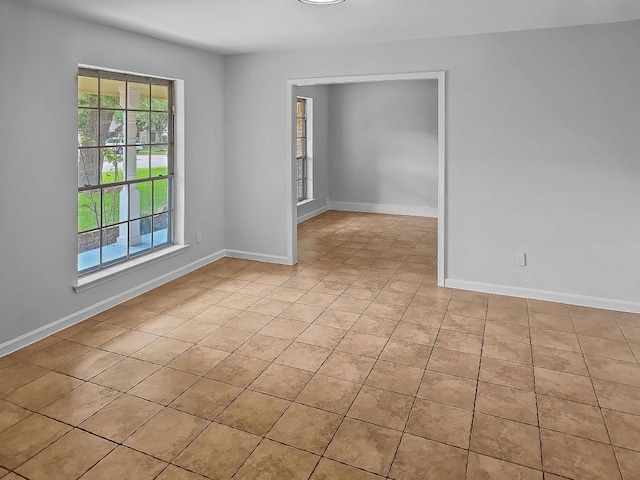 1801 Rock Creek Dr, Round Rock, TX 78681 - empty room with baseboards and light tile patterned flooring