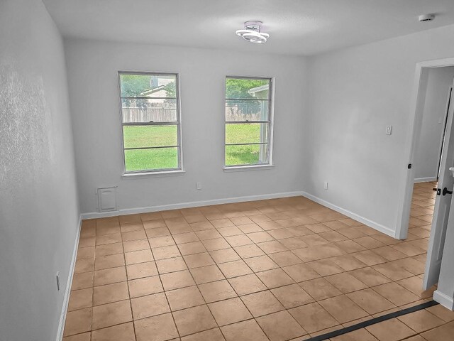1801 Rock Creek Dr, Round Rock, TX 78681 - unfurnished room featuring light tile patterned floors and baseboards