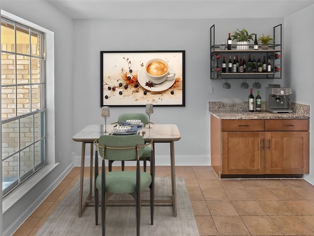 1801 Rock Creek Dr, Round Rock, TX 78681 - indoor dry bar featuring light tile patterned floors and baseboards