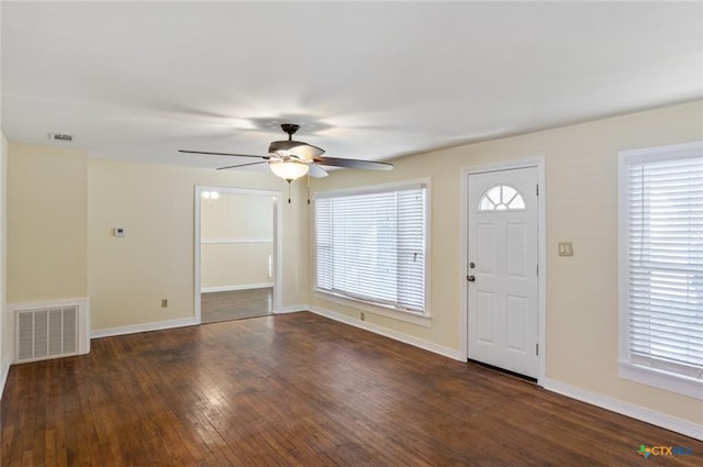 1518 S 37th St, Temple, TX 76504 - entrance foyer featuring ceiling fan, dark wood-style floors, and baseboards