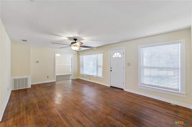 1518 S 37th St, Temple, TX 76504 - foyer entrance featuring a ceiling fan, baseboards, and dark wood-style floors
