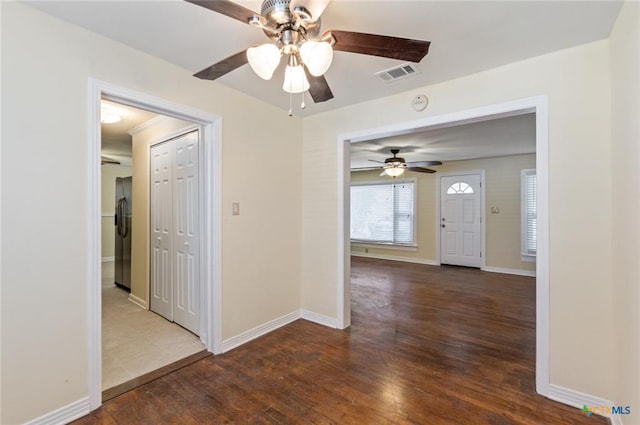 1518 S 37th St, Temple, TX 76504 - unfurnished room with a ceiling fan, wood-type flooring, and baseboards