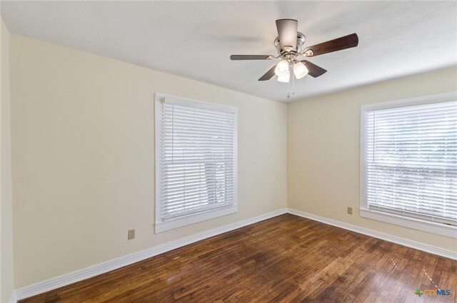 1518 S 37th St, Temple, TX 76504 - unfurnished room with wood finished floors, baseboards, and ceiling fan