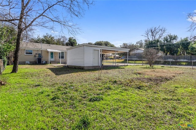 1518 S 37th St, Temple, TX 76504 - view of yard featuring a carport