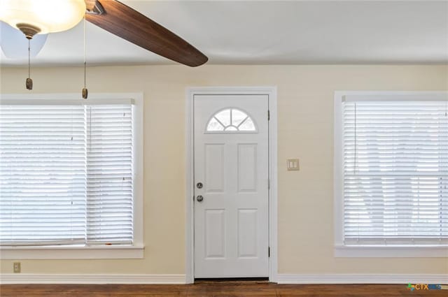 1518 S 37th St, Temple, TX 76504 - foyer entrance with wood finished floors, baseboards, and beamed ceiling