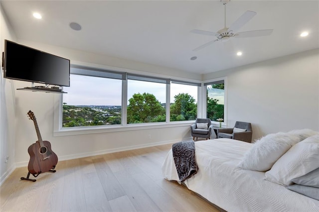 402 Buckeye Trl, West Lake Hills, TX 78746 - bedroom featuring light wood finished floors, baseboards, recessed lighting, and ceiling fan