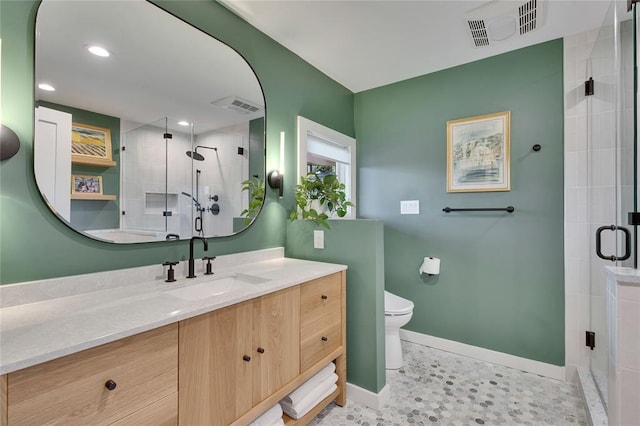 402 Buckeye Trl, West Lake Hills, TX 78746 - full bath with baseboards, a shower stall, vanity, toilet, and recessed lighting