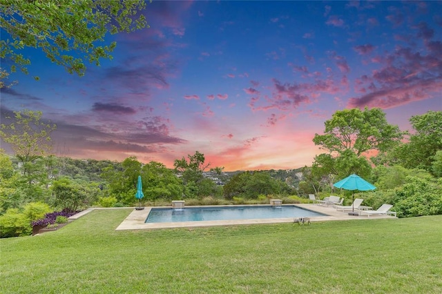 402 Buckeye Trl, West Lake Hills, TX 78746 - pool at dusk with a yard, a patio, and an outdoor pool