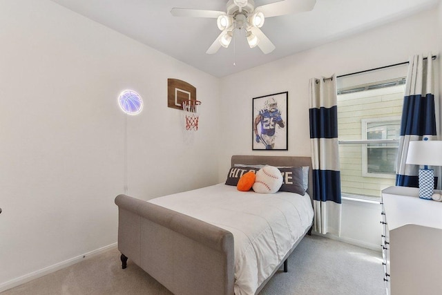 418 Rosedale Blvd, Georgetown, TX 78628 - bedroom featuring light carpet, baseboards, and ceiling fan