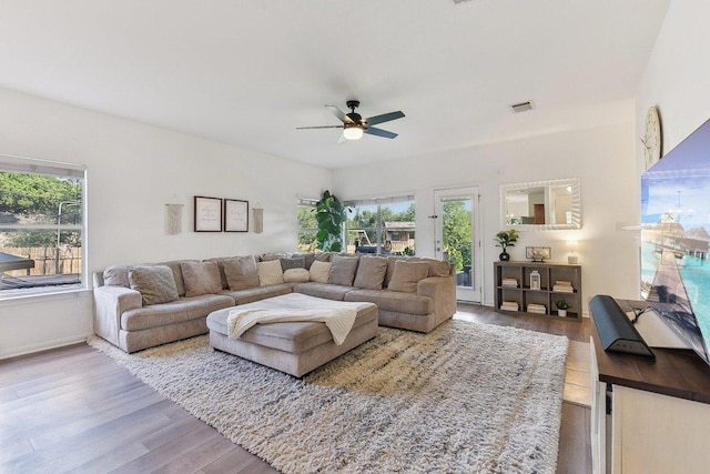 418 Rosedale Blvd, Georgetown, TX 78628 - living area with wood finished floors, ceiling fan, and baseboards
