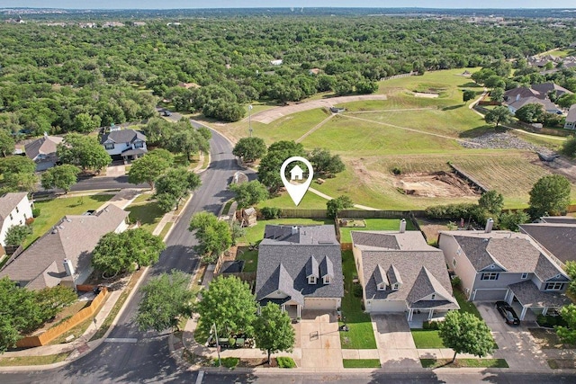 418 Rosedale Blvd, Georgetown, TX 78628 - aerial view of residential area with a forest