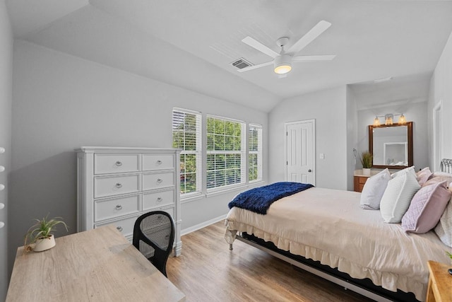 10216 Chaska Cv, Austin, TX 78739 - bedroom with vaulted ceiling, light wood-style flooring, baseboards, and ceiling fan