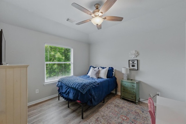 10216 Chaska Cv, Austin, TX 78739 - bedroom with wood finished floors, ceiling fan, and baseboards