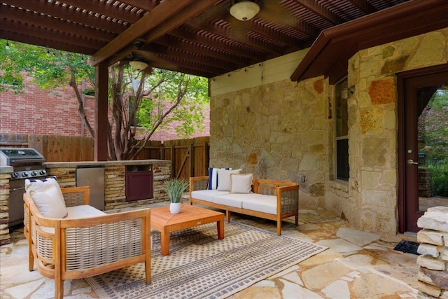 12920 Little Dipper Path, Austin, TX 78732 - view of patio with fence, an outdoor kitchen, outdoor lounge area, a pergola, and a grill