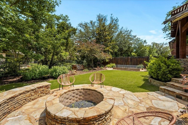 12920 Little Dipper Path, Austin, TX 78732 - view of patio with an outdoor fire pit
