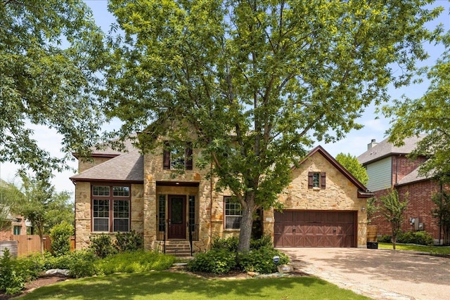 12920 Little Dipper Path, Austin, TX 78732 - view of front of home featuring stone siding and driveway
