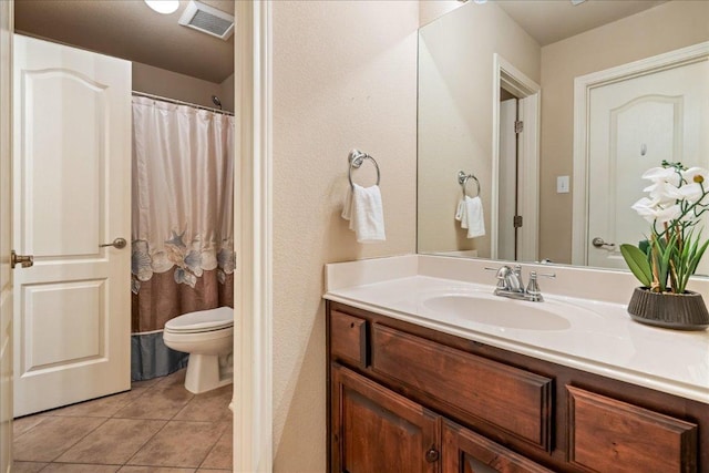 12920 Little Dipper Path, Austin, TX 78732 - bathroom with tile patterned flooring, toilet, and vanity