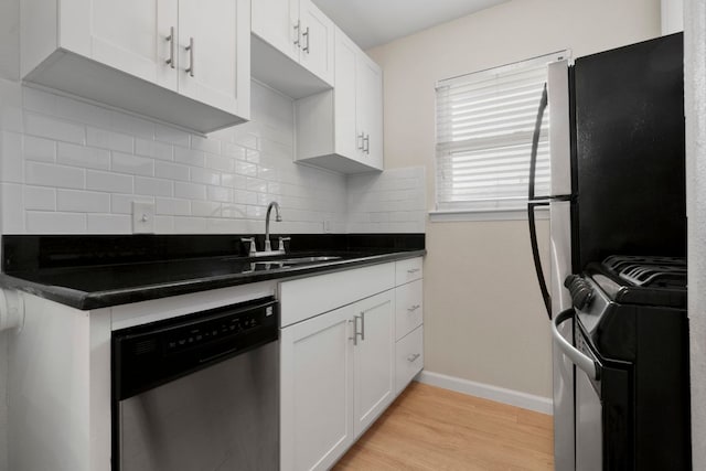 2401 Manor Rd Unit 235, Austin, TX 78722 - kitchen with stainless steel dishwasher, stove, a sink, backsplash, and dark countertops