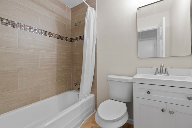 2401 Manor Rd Unit 235, Austin, TX 78722 - full bathroom featuring vanity, shower / bath combo, and toilet