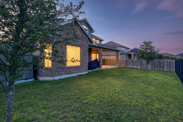rear view of house with brick siding