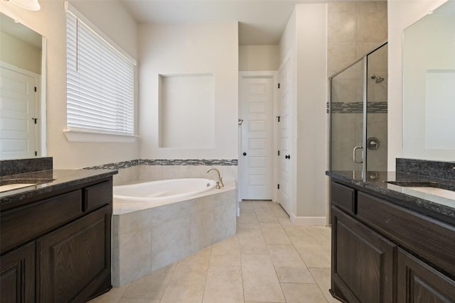 3351 Vasquez Pl, Round Rock, TX 78665 - full bath with a shower stall, two vanities, a bath, and tile patterned flooring