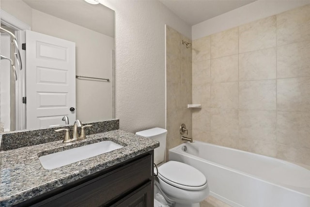 3351 Vasquez Pl, Round Rock, TX 78665 - bathroom with vanity, shower / bathtub combination, and a textured wall