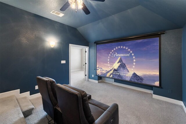 3351 Vasquez Pl, Round Rock, TX 78665 - home theater featuring lofted ceiling, ceiling fan, and carpet