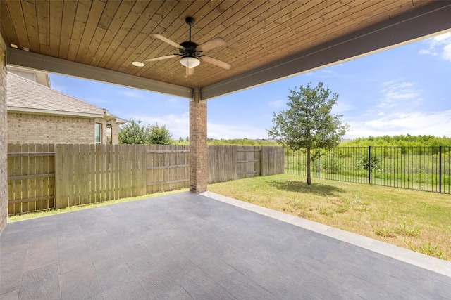 3351 Vasquez Pl, Round Rock, TX 78665 - fenced backyard with ceiling fan and a patio