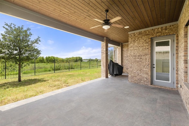 3351 Vasquez Pl, Round Rock, TX 78665 - fenced backyard featuring a ceiling fan, a patio area, and a grill
