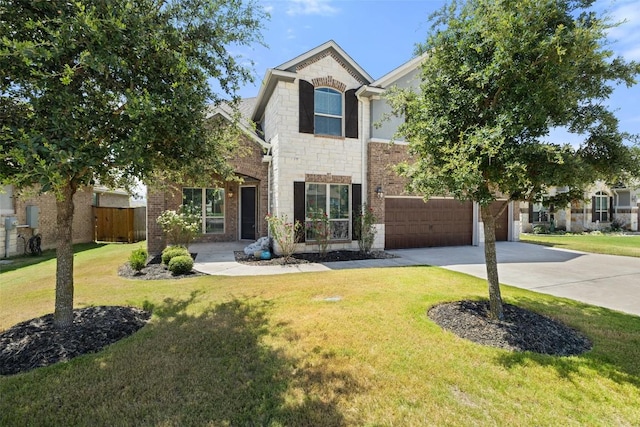 3351 Vasquez Pl, Round Rock, TX 78665 - traditional-style home with driveway, stone siding, an attached garage, and brick siding