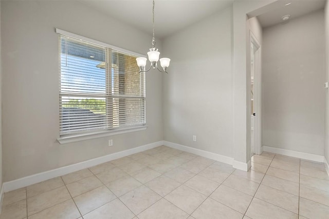 3351 Vasquez Pl, Round Rock, TX 78665 - empty room with a chandelier and light tile patterned floors