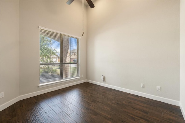 3351 Vasquez Pl, Round Rock, TX 78665 - spare room featuring ceiling fan, dark wood-style flooring, and a high ceiling